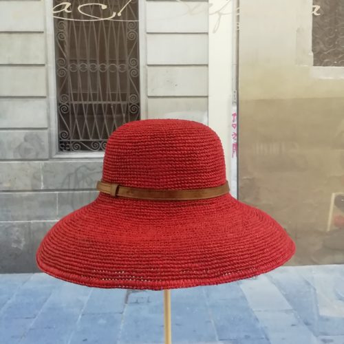Pamela cloche hat by Ibeliv. Handmade in red raphia with leather band. Foldable hat