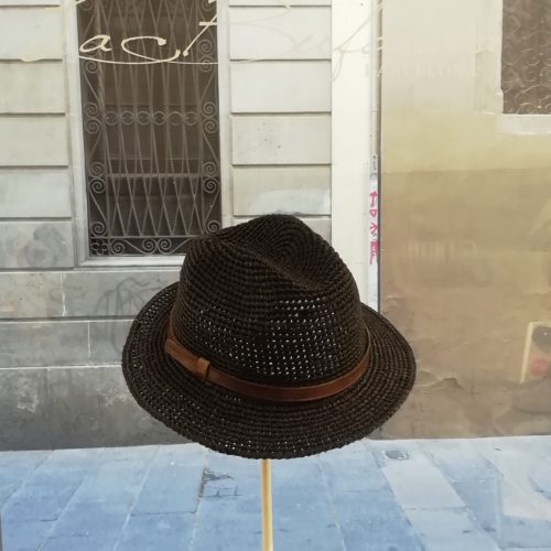 Fedora hat by Ibeliv. Handmade in black raphia with leather band. Foldable hat